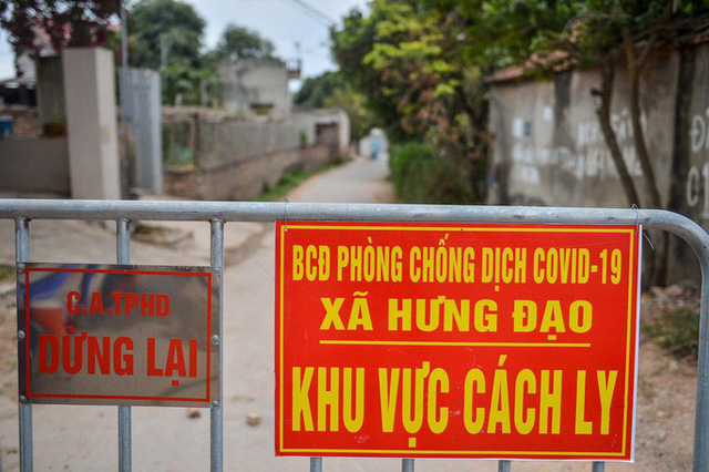  Có phải ai ở vùng dịch Covid-19 về quê ăn Tết cũng phải cách ly? - Ảnh 2.