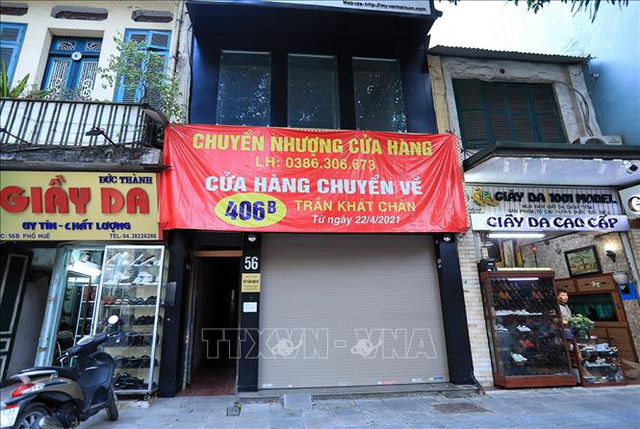 Hà Nội: Mặt bằng kinh doanh vắng khách thuê do ảnh hưởng dịch COVID-19 - Ảnh 1. Hà Nội: Mặt bằng kinh doanh vắng khách thuê do ảnh hưởng dịch COVID-19 - Ảnh 1.