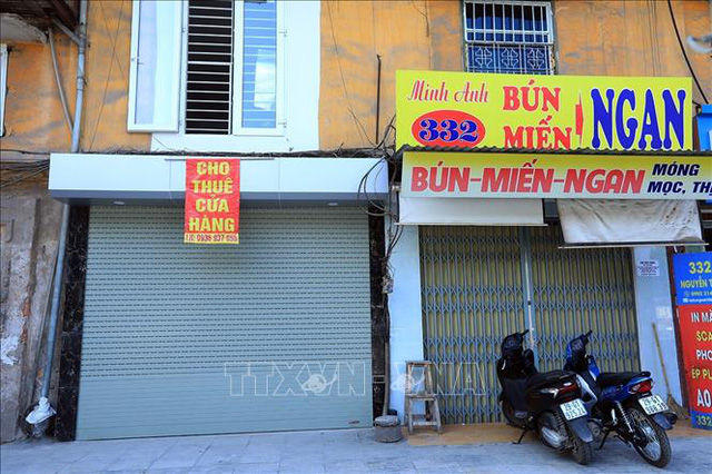 Hà Nội: Mặt bằng kinh doanh vắng khách thuê do ảnh hưởng dịch COVID-19 - Ảnh 4. Hà Nội: Mặt bằng kinh doanh vắng khách thuê do ảnh hưởng dịch COVID-19 - Ảnh 4.