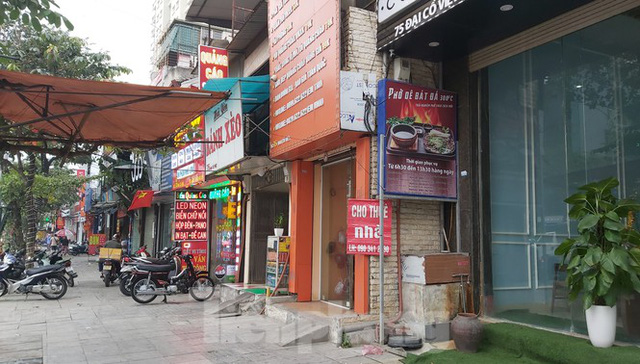 Hàng loạt khách sạn, cửa hàng Hà Nội treo biển cho thuê sau Tết - Ảnh 9.