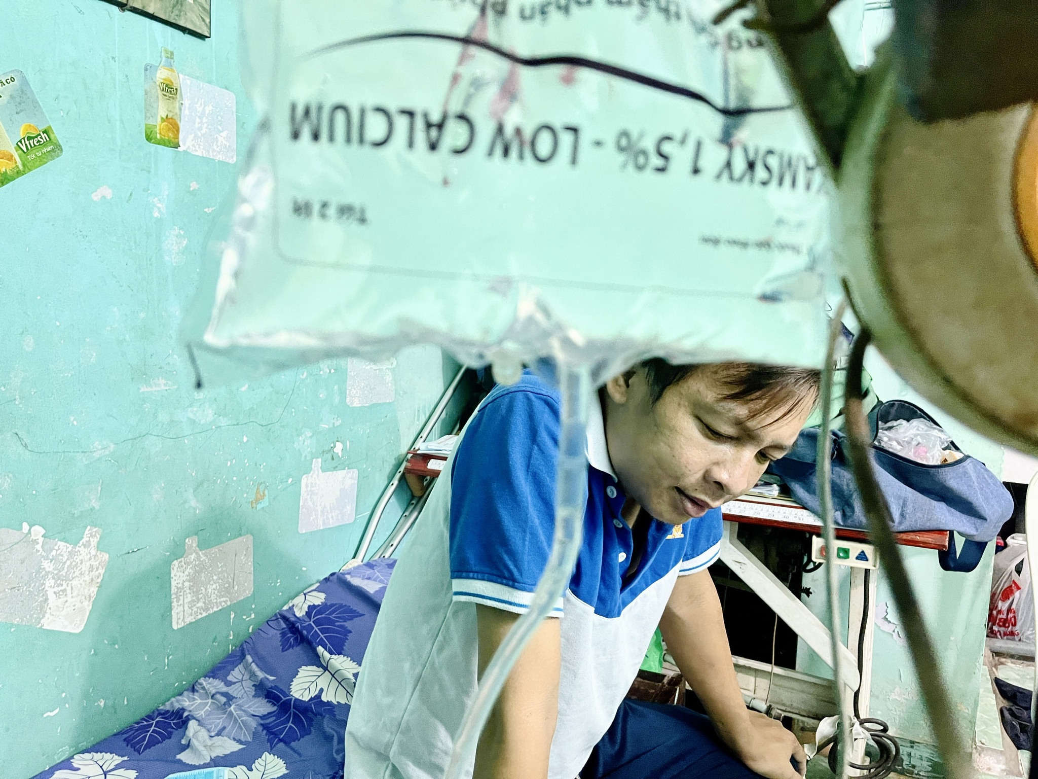 Tài xế công nghệ chạy xe kiếm tiền lọc màng bụng: ‘Vì con, phải sống’ - ảnh 1